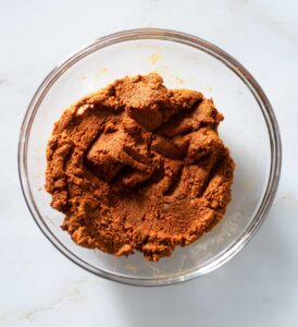 Spice paste in a glass bowl.