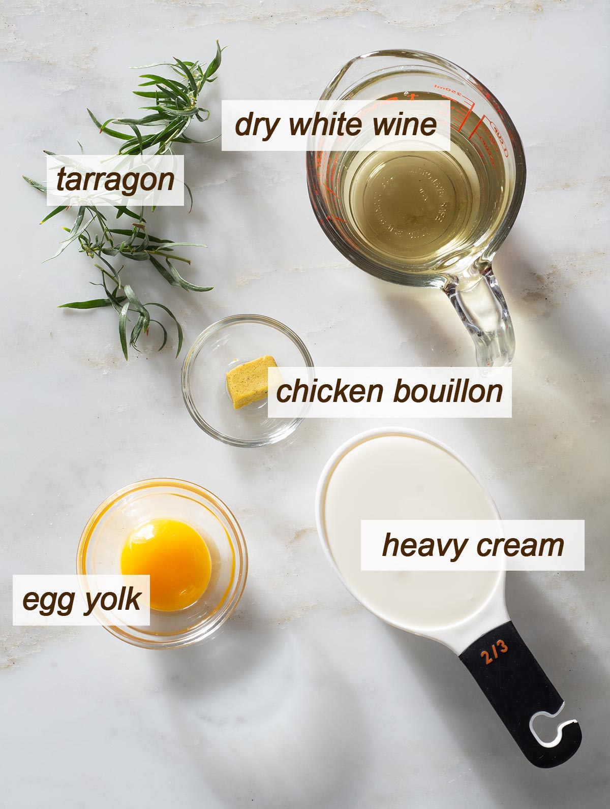 Tarragon cream sauce ingredients on a table.