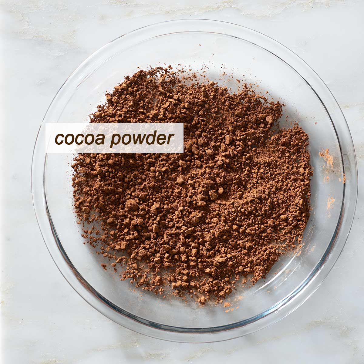 Cocoa powder on a glass plate.