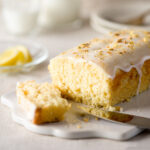 Lemon cardamom cake on a cutting board.