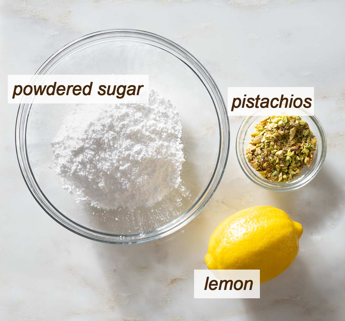 Powdered sugar, pistachios and lemon.