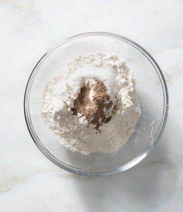 Dry ingredients in a glass bowl.