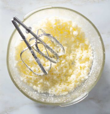 Creamed butter and sugar in a mixing bowl.