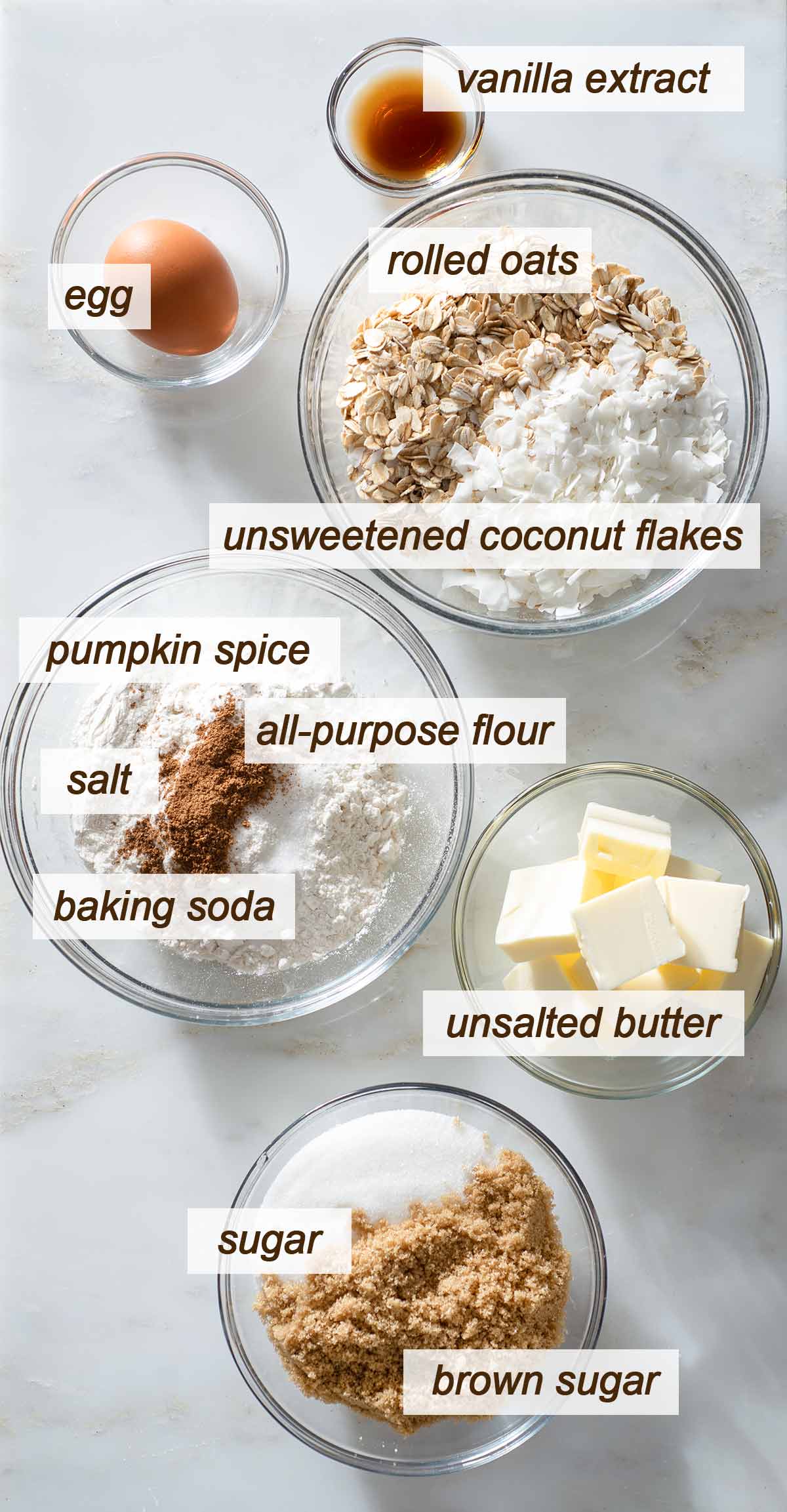 Oatmeal cookie dough ingredients on a table.