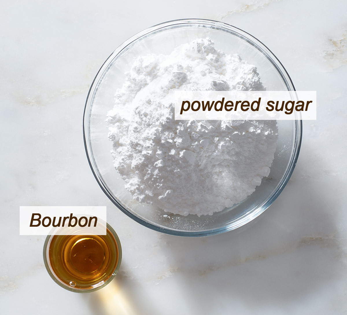 Bourbon cookie glaze ingredients on a table.