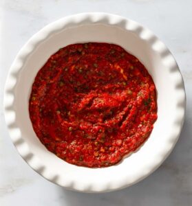 Tomato pasta sauce in a baking dish.