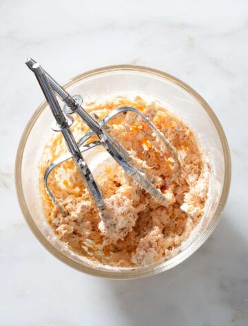 Whipped cream cheese filling ingredients in a bowl.