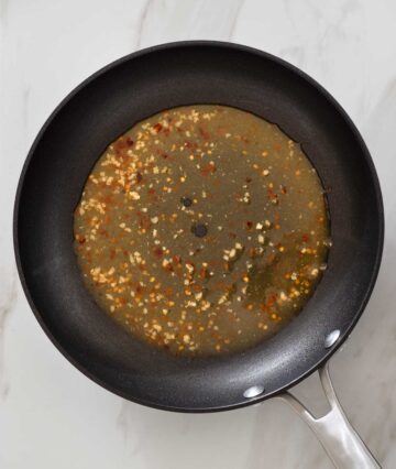 White wine sauce in a pan.