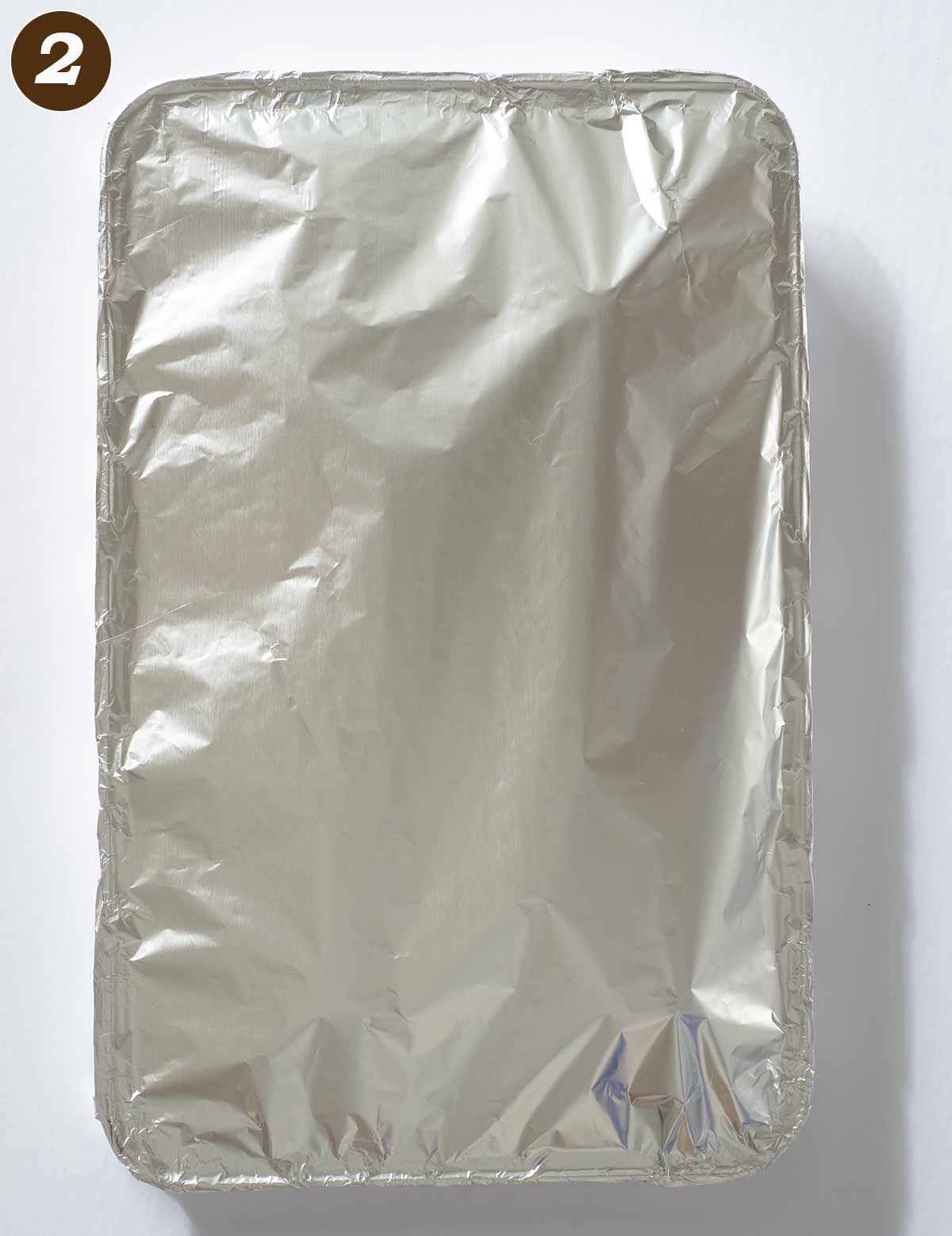 Baking sheet covered with aluminum foil.