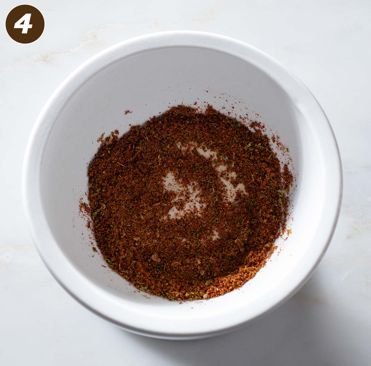 Chili lime seasoning in a mortar.