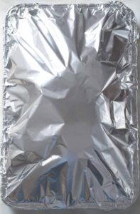 Baking sheet covered with aluminum foil.