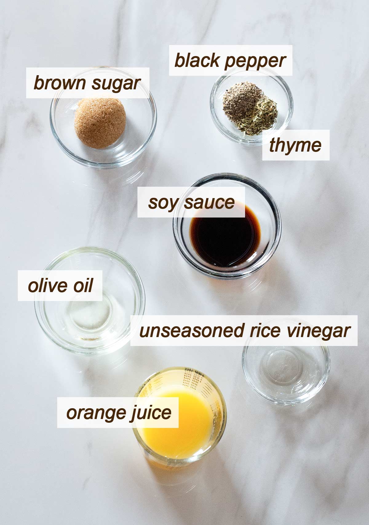 Brown sugar, black pepper, thyme, soy sauce, olive oil, orange juice and rice vinegar.