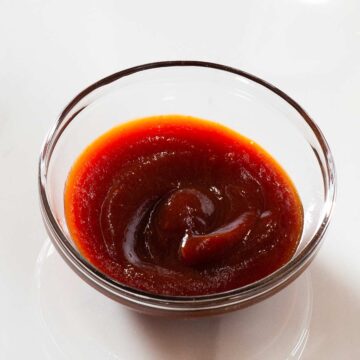Sriracha bbq sauce in a small bowl.