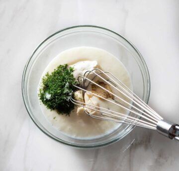 Buttermilk sauce ingredients in a bowl.