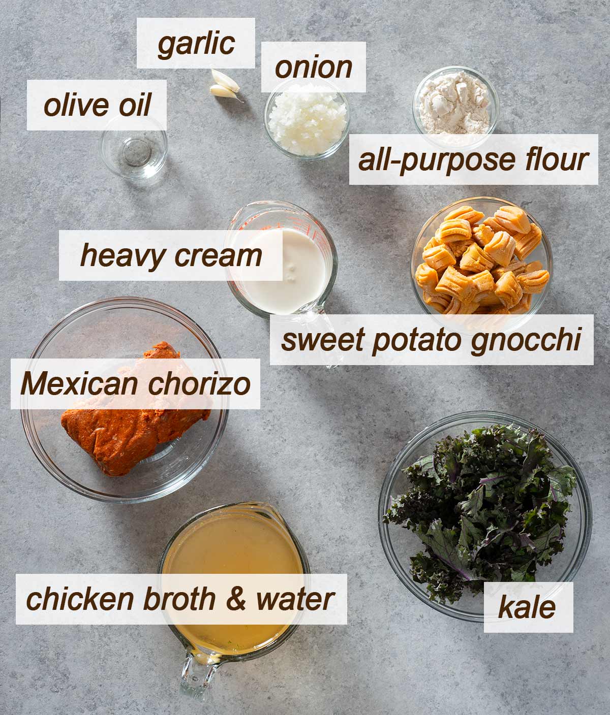 Mexican chorizo, sweet potato gnocchi, garlic, onion, oil, flour, cream, kale and chicken broth.