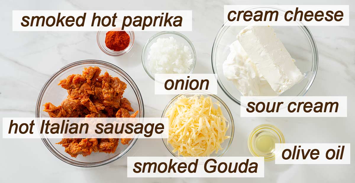 Smoked paprika, cream cheese, sour cream, onion, oil, smoked Gouda and Italian sausage.