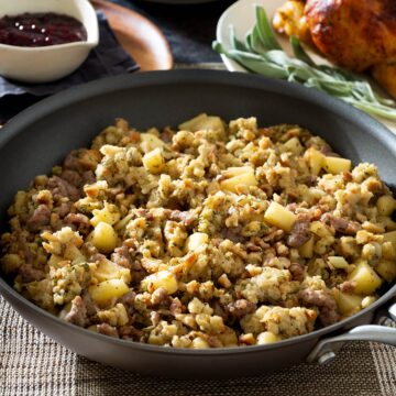 Stuffing with sausage and apples in a skillet.