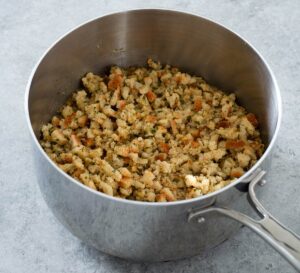 Cooked stuffing in a saucepan.