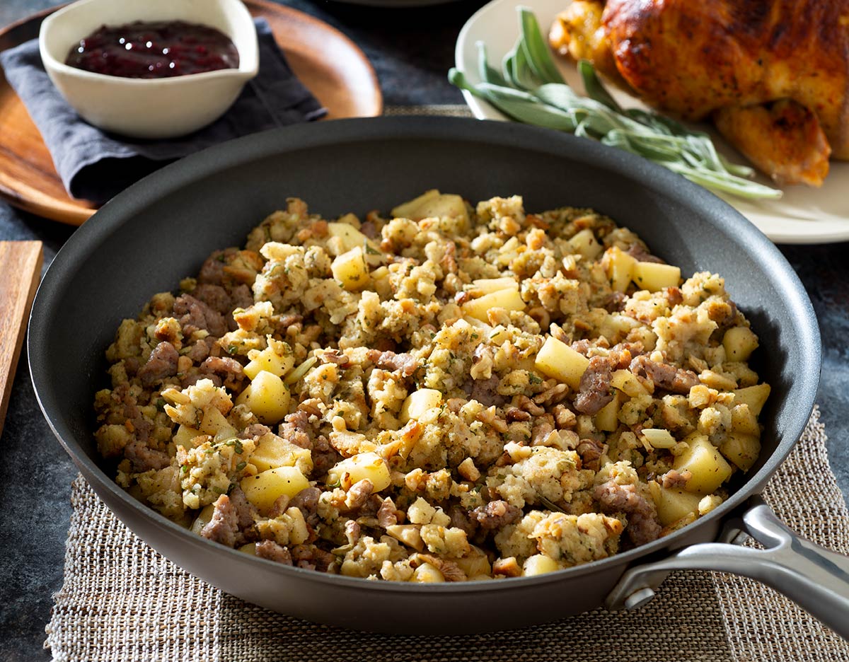Stuffing with sausage and apples in a skillet.