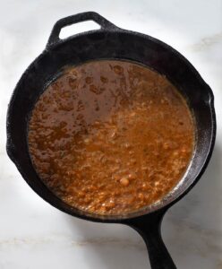 Pan sauce in a cast iron pan.