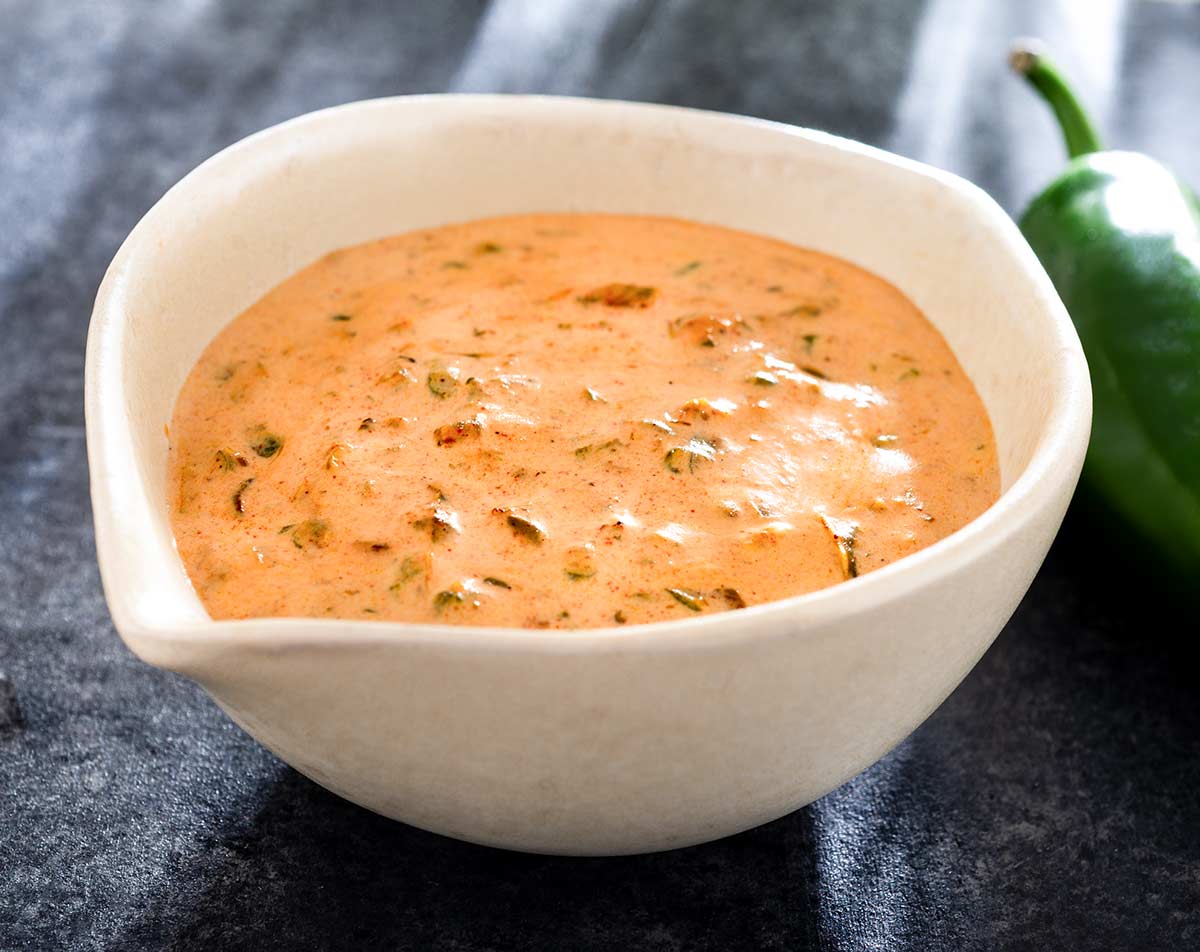 Charred jalapeno pepper cream sauce in a bowl.