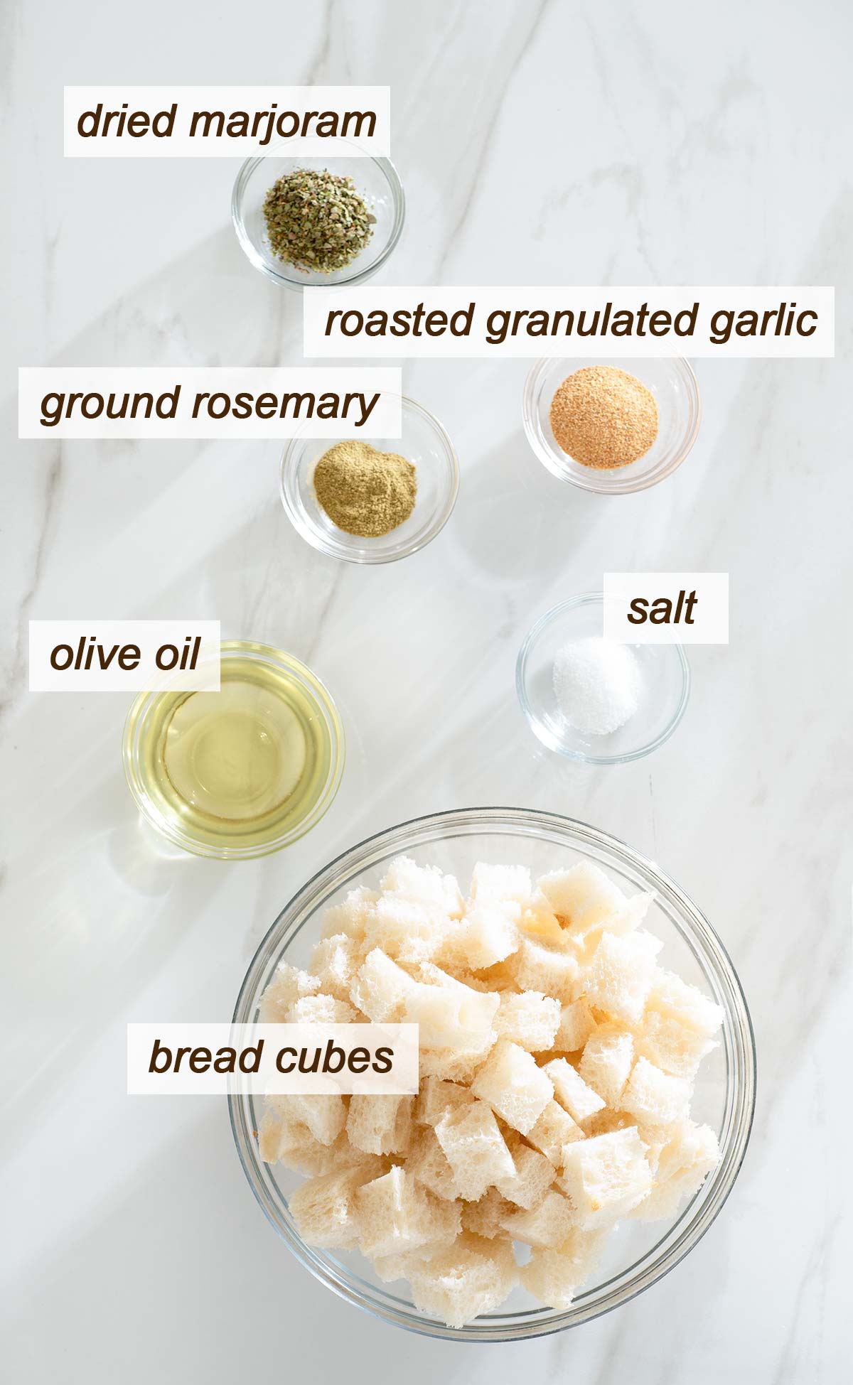 Marjoram, roasted granulated garlic, rosemary, salt, oil and bread cubes.