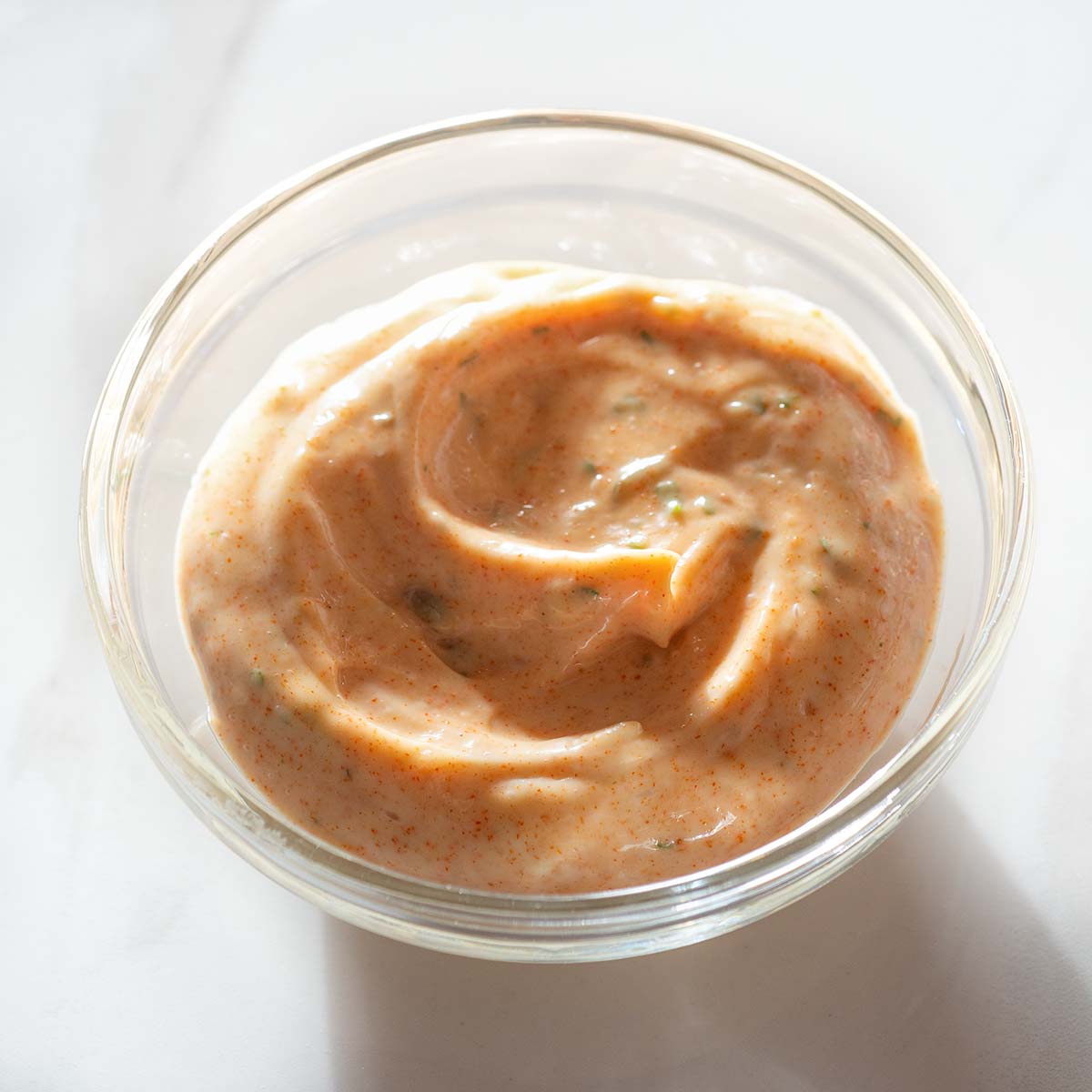 Remoulade sauce with capers in a bowl.