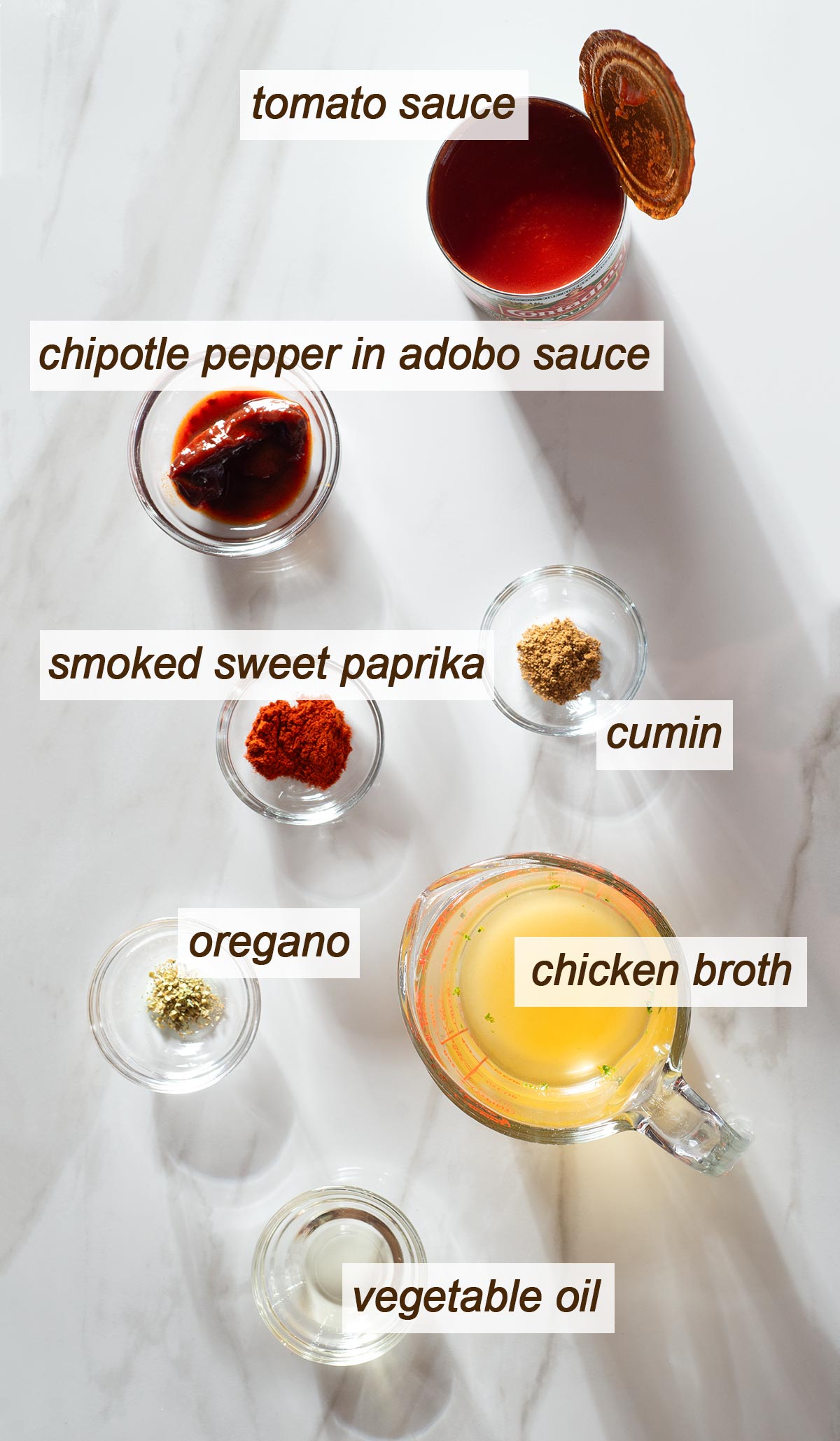 Tomato sauce, chipotle pepper and adobo sauce, cumin, oregano, smoked sweet paprika, chicken broth and oil.