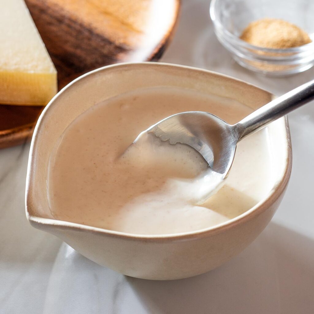 Parmesan cream sauce in a bowl.