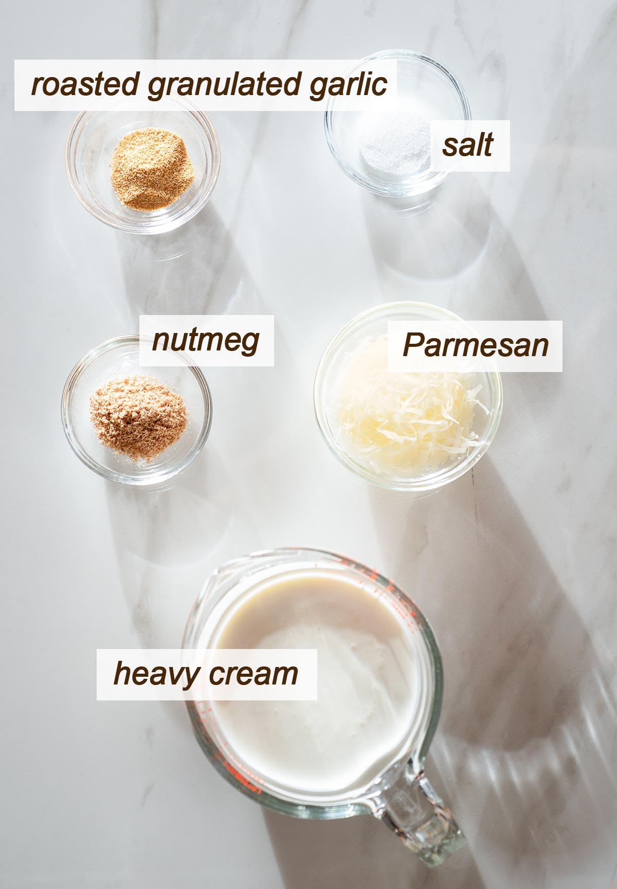 Parmesan, nutmeg, roasted granulated garlic, salt and heavy cream.