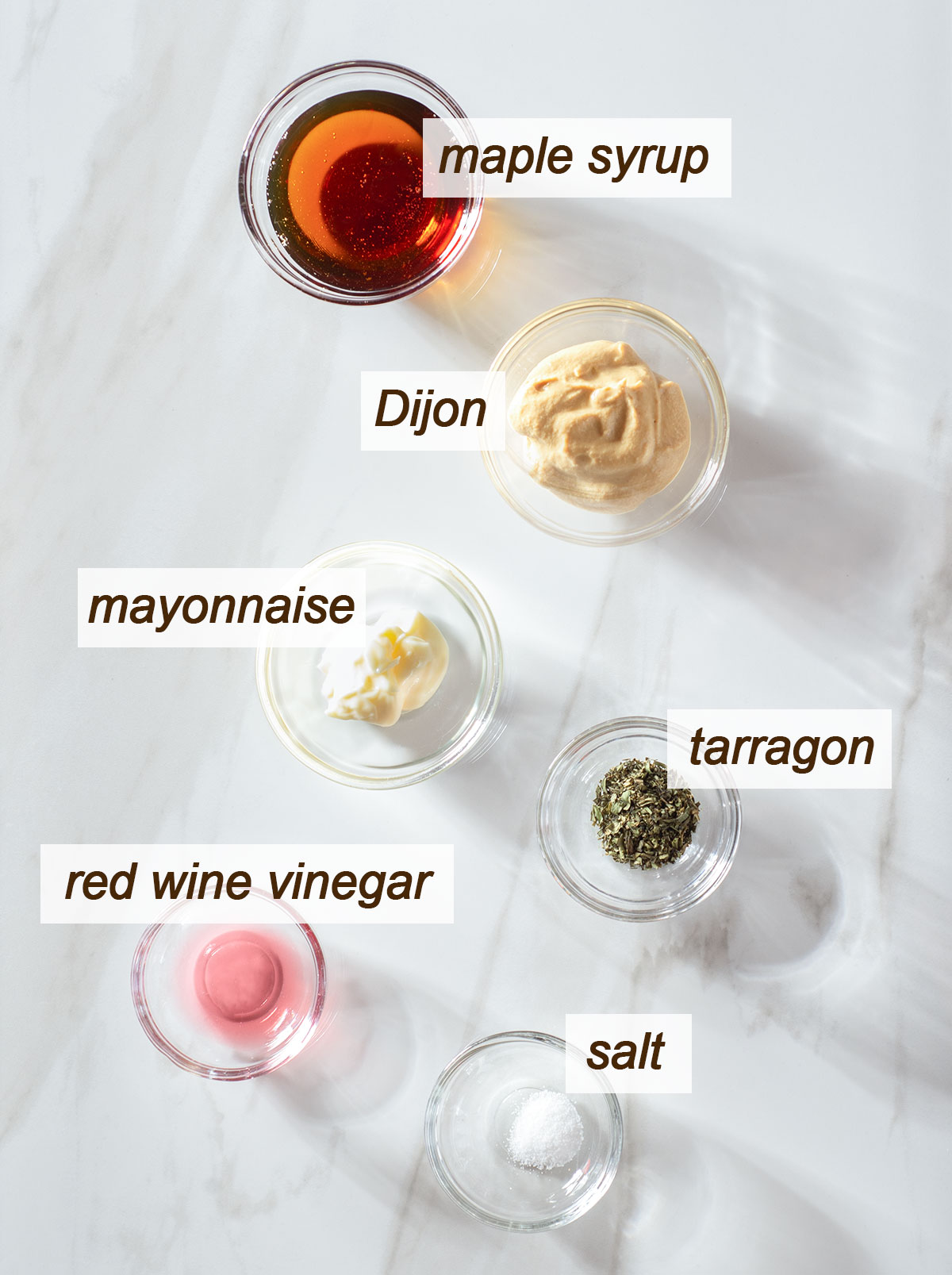 Maple syrup, Dijon, mayonnaise, tarragon, salt and red wine vinegar.