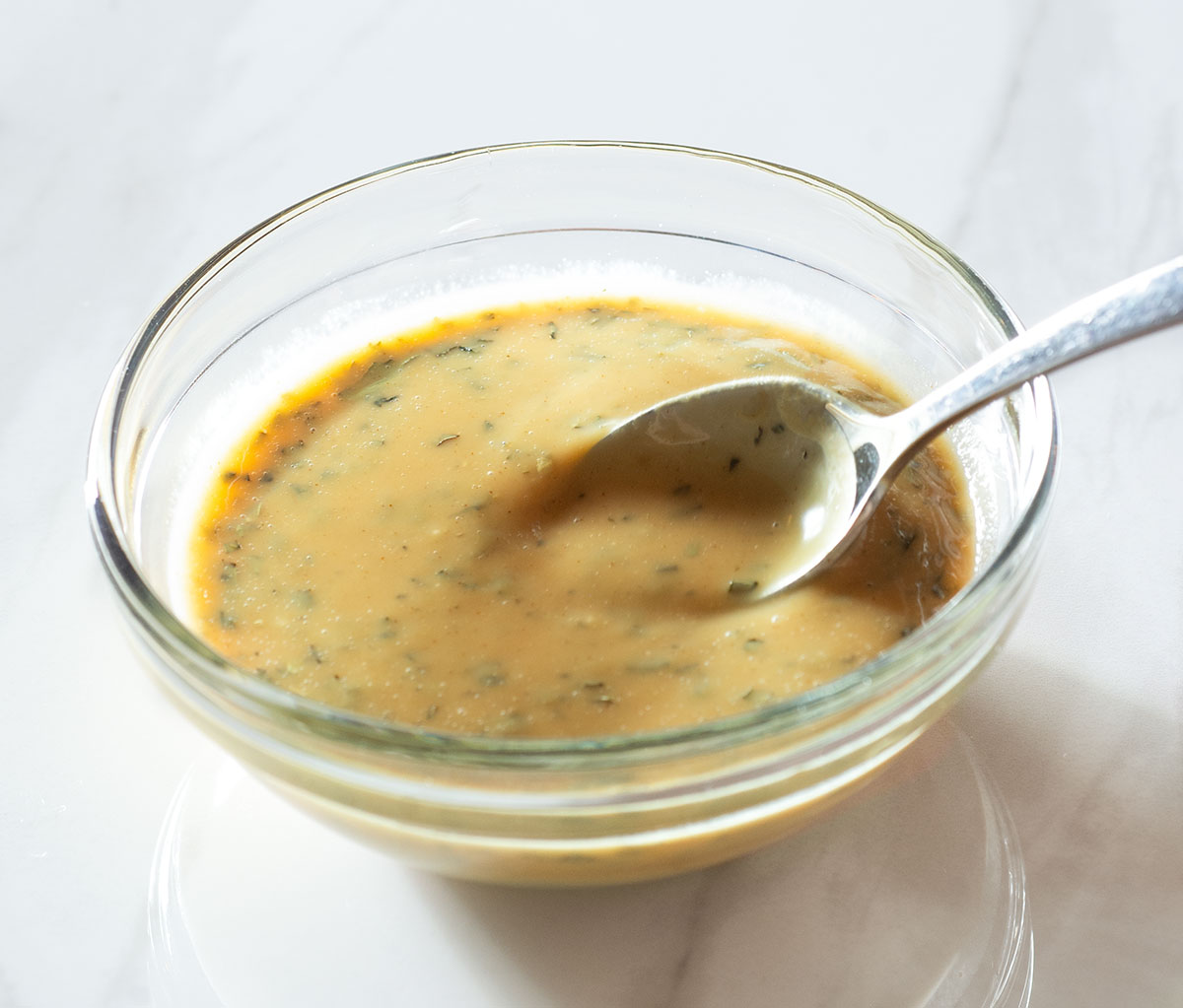 Maple Dijon dipping sauce in a bowl.