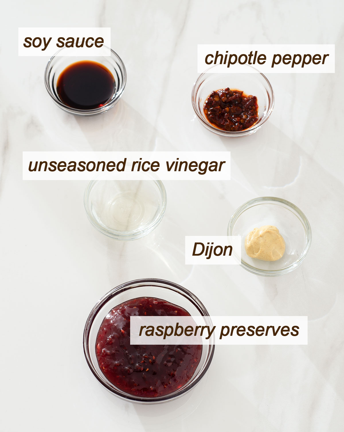 Soy sauce, chipotle pepper, rice vinegar, Dijon and raspberry preserves.
