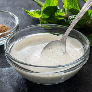 Sour cream mint sauce in a bowl.