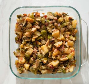 Brussels sprouts strata before baking.