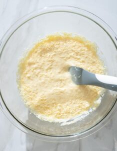 Cheese and dairy being mixed.